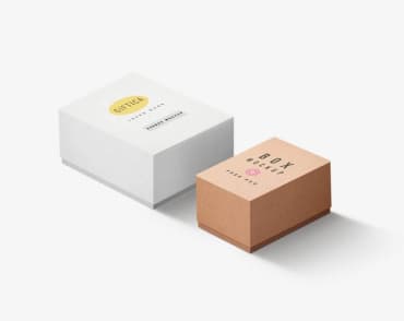 Две картонные коробки. Одна белая, а вторая бежевая